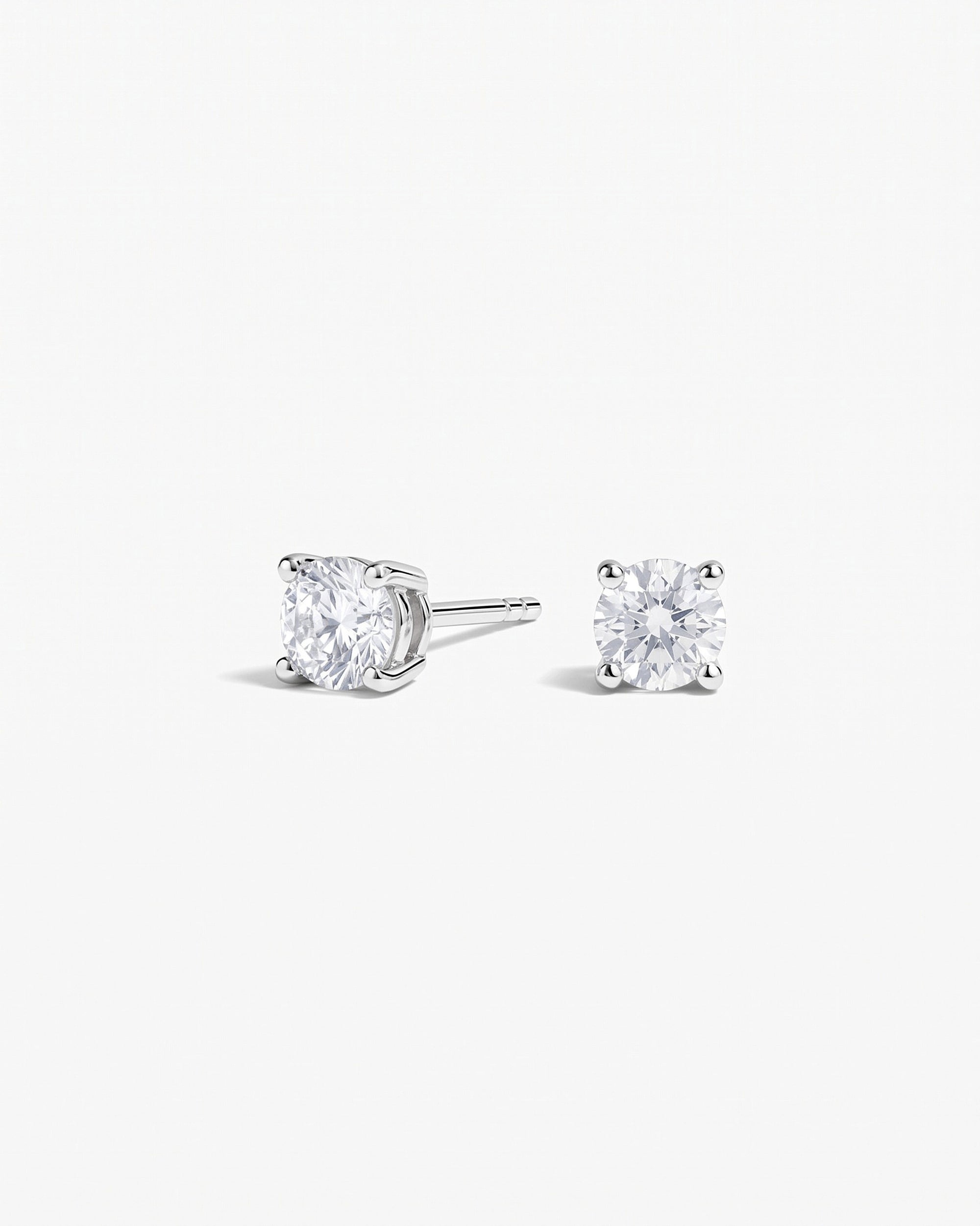 Como Round White Sapphire Stud Earrings