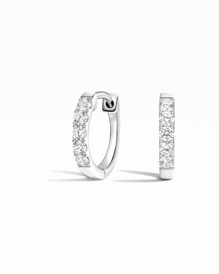 Capri Round White Sapphire Huggie Earrings - Image 1
