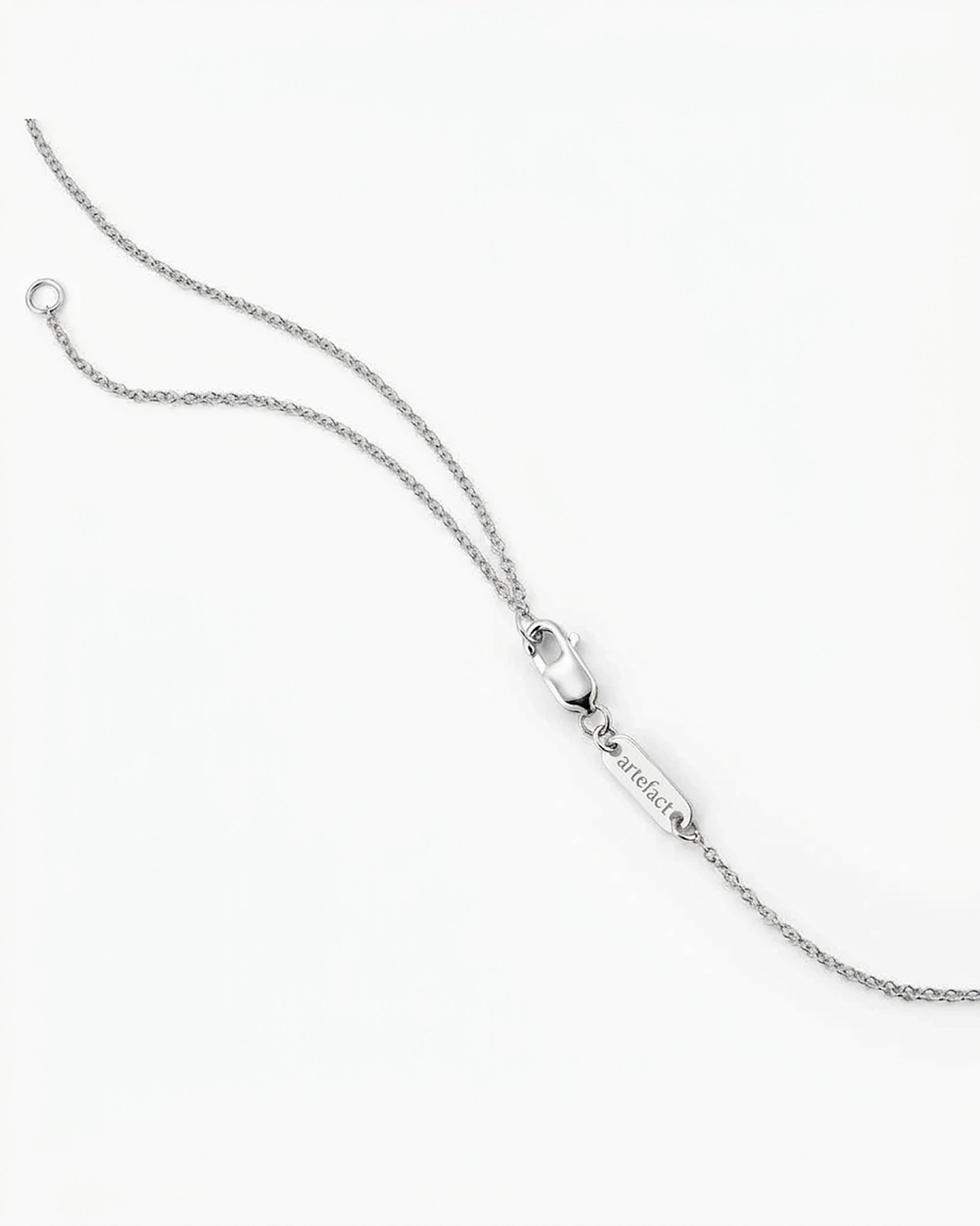 Sterling silver chain with Artefact logo plate and lobster clasp