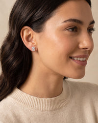 Louvre Emerald Cut White Sapphire Stud Earrings worn by model