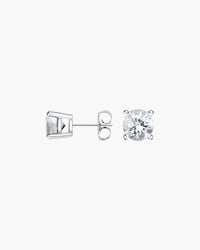 Como Round White Sapphire Stud Earrings - side view with earring backs